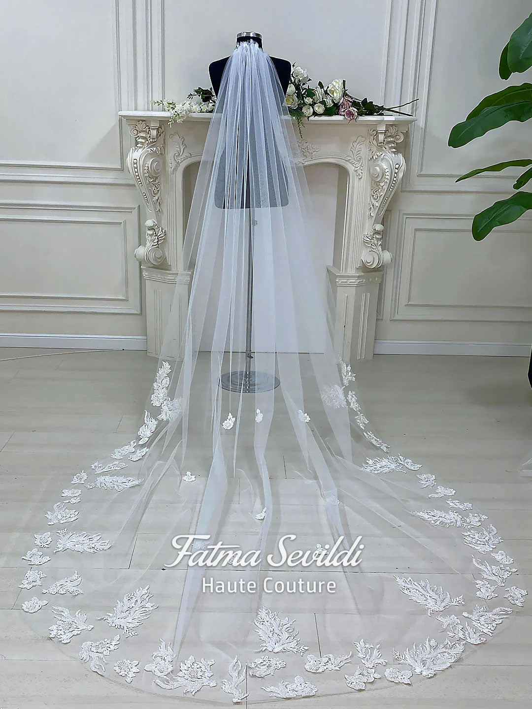 Luxury veiled hijab wedding dress with beaded lace, long sleeves, full coverage bodice, and elegant A-line bridal silhouette. Modest Muslim wedding gown with custom couture detailing and romantic lace veil.
