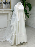 Elegant veiled hijab satin A-line wedding gown with lace sleeves and pearl veil