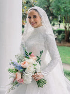 Veiled hijab white lace wedding gown with high neck, long sleeves, beaded edges