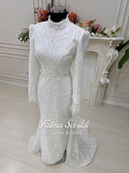 White beaded mermaid hijab wedding gown with detachable skirt