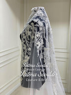 Elegant black and silver lace bridal veil with floral embroidery