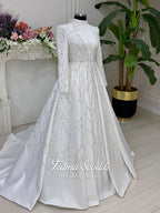 Elegant high neck beaded lace long sleeve A-line wedding gown with silver branch patterns