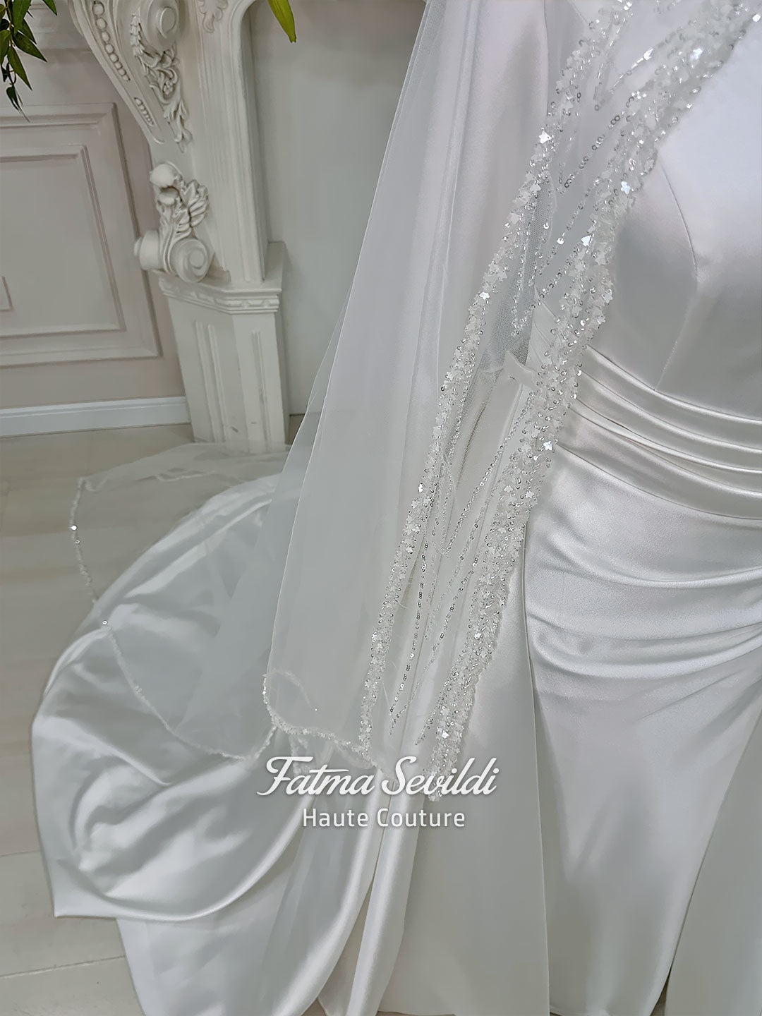 Veiled satin Muslim wedding dress with long sleeves, high neckline, beaded veil