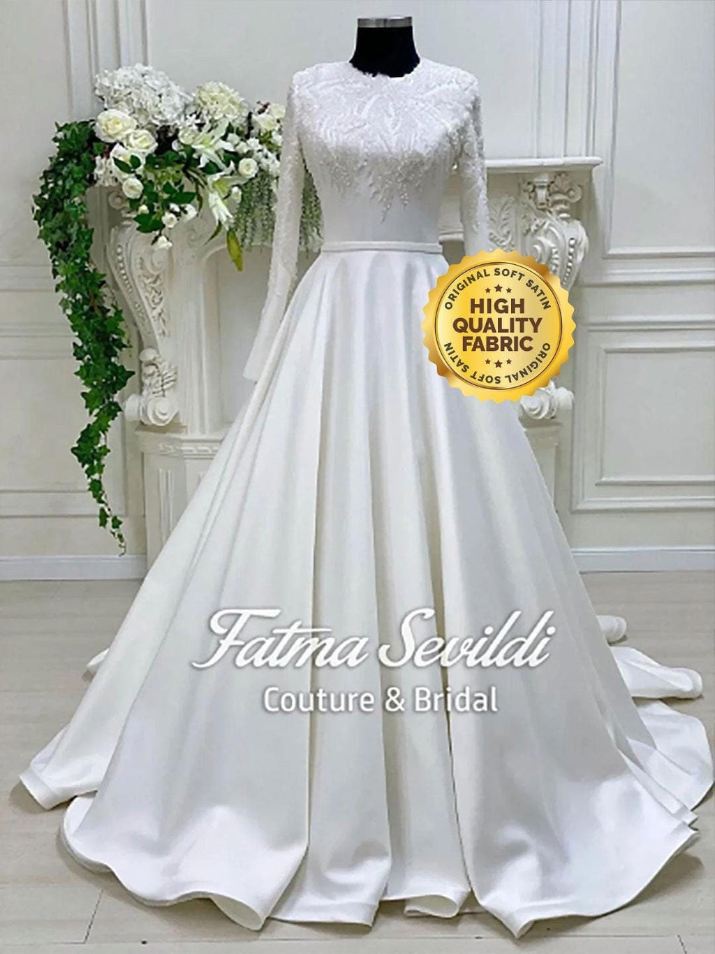 White satin modest A-line wedding dress with lace bodice, long sleeves and veil