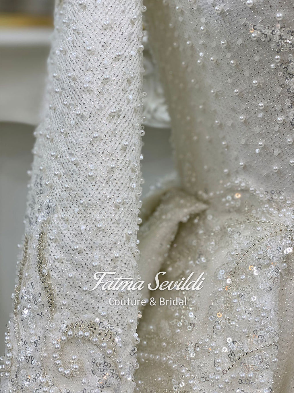 Veiled modest wedding dress with beaded lace, high neck, long sleeves
