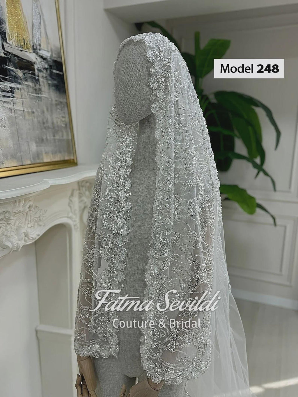 Delicate sheer white lace cathedral bridal veil with silver beading