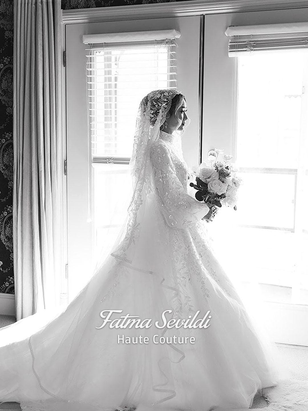 White lace veiled hijab wedding gown with balloon sleeves and beaded embroidery