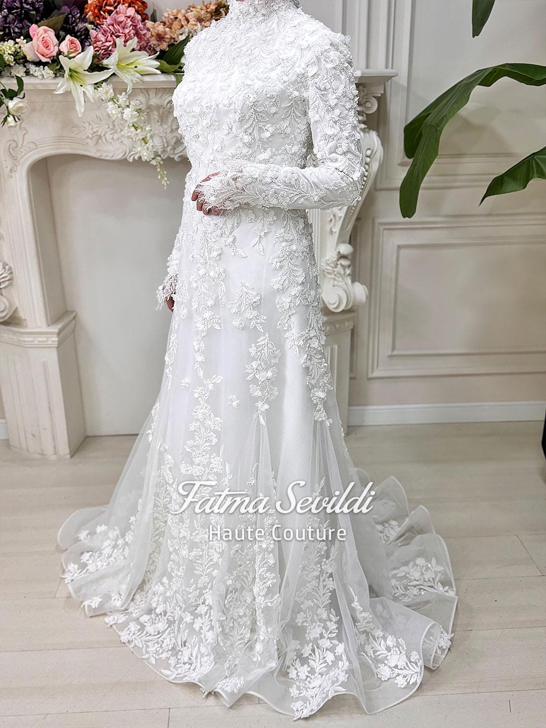 Elegant mermaid hijab wedding dress with high neck, long sleeves, 3D lace