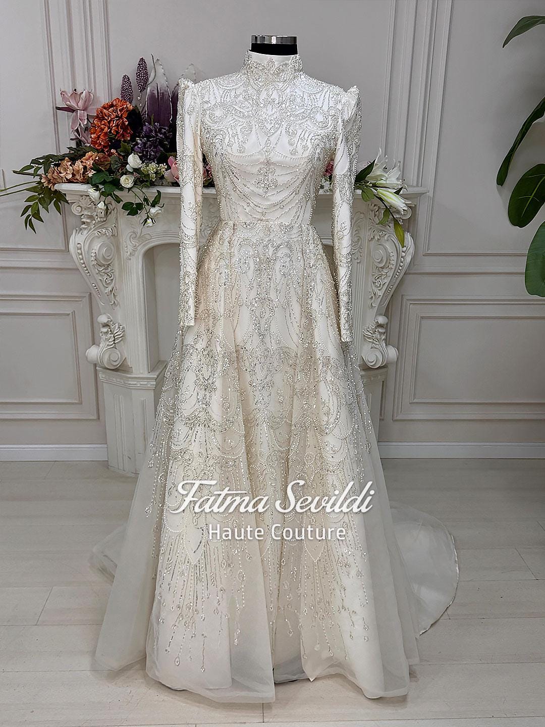 Elegant veiled hijab wedding dress with ivory beading and lace