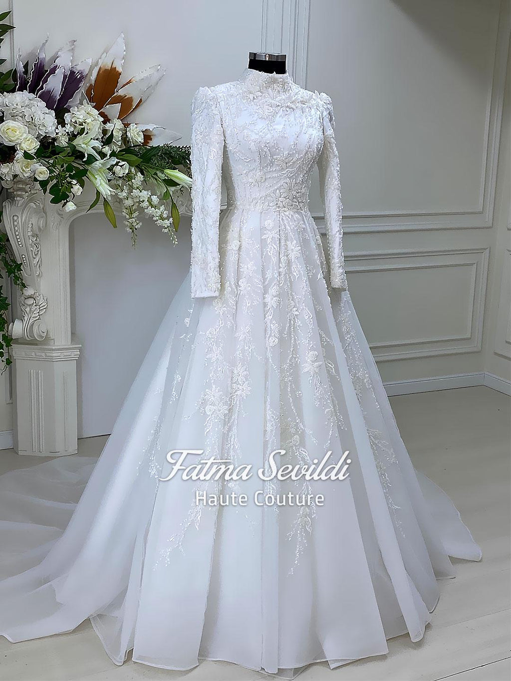 Elegant veiled Muslim wedding dress with high neck beaded lace