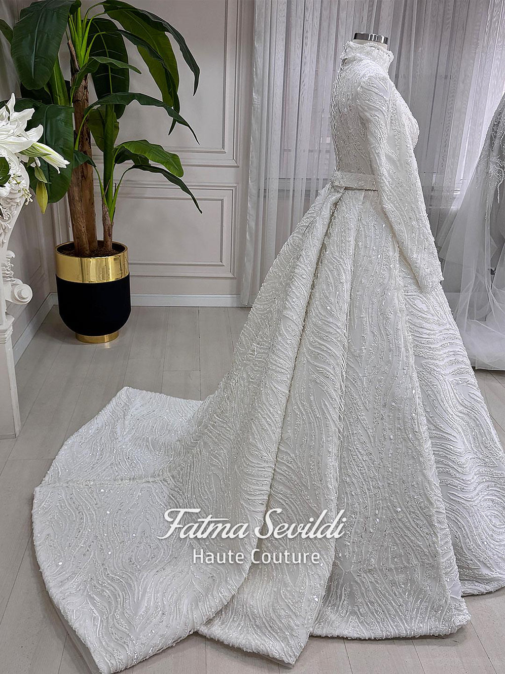 Luxurious A-line hijab wedding dress with beaded lace, high neck, long sleeves