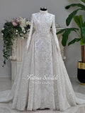 Luxury modest hijab wedding dress with white lace, silver embroidery, long sleeves, veil, and beading on mannequin