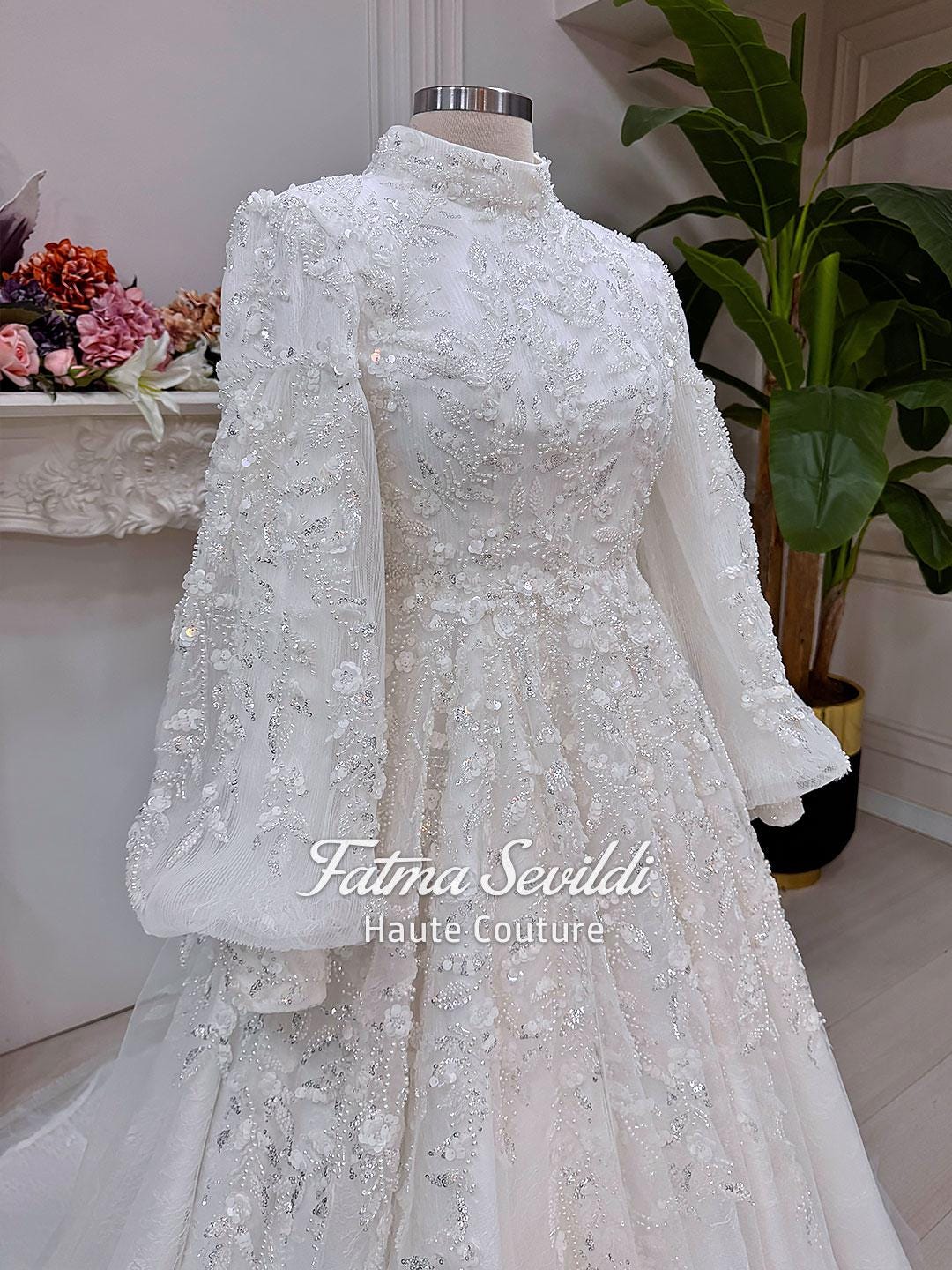 Veiled hijab wedding dress with balloon sleeves, high neck, beaded lace ballgown