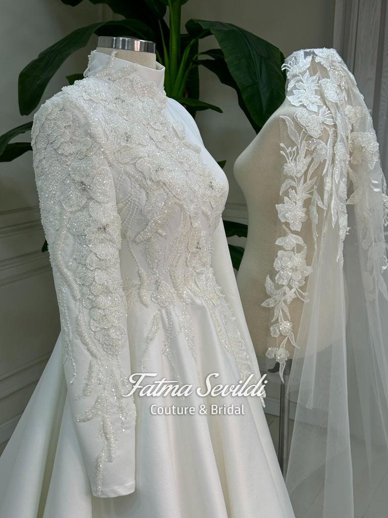 Veiled Satin Hijab Wedding Dress with Floral Lace and Flowing Skirt
