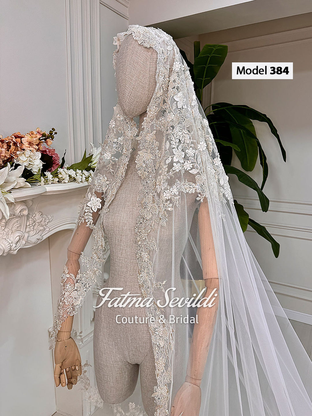 Delicate white lace bridal veil with 3D floral embroidery on mannequin