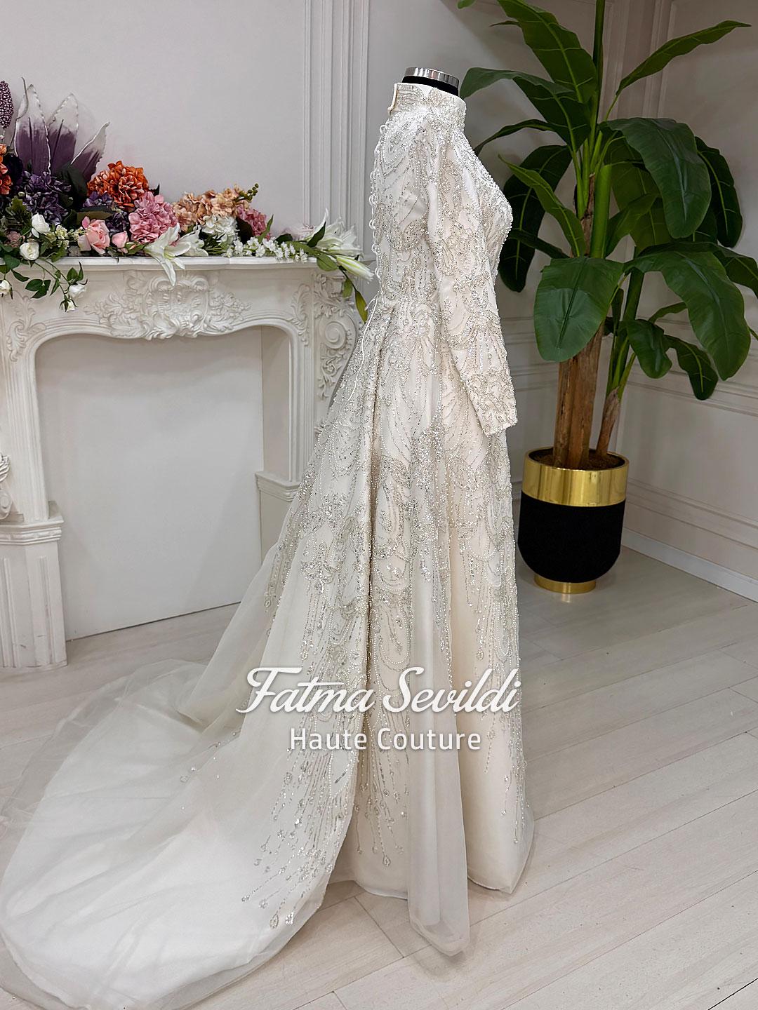 Elegant veiled hijab wedding gown in ivory with beaded lace embroidery