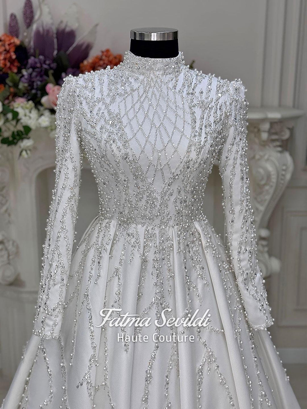 Veiled Pearl hijab wedding dress with silver beaded lace sleeves