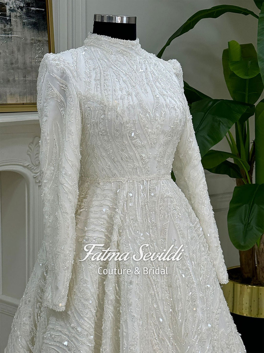 White beaded lace hijab wedding dress with high neck and long sleeves