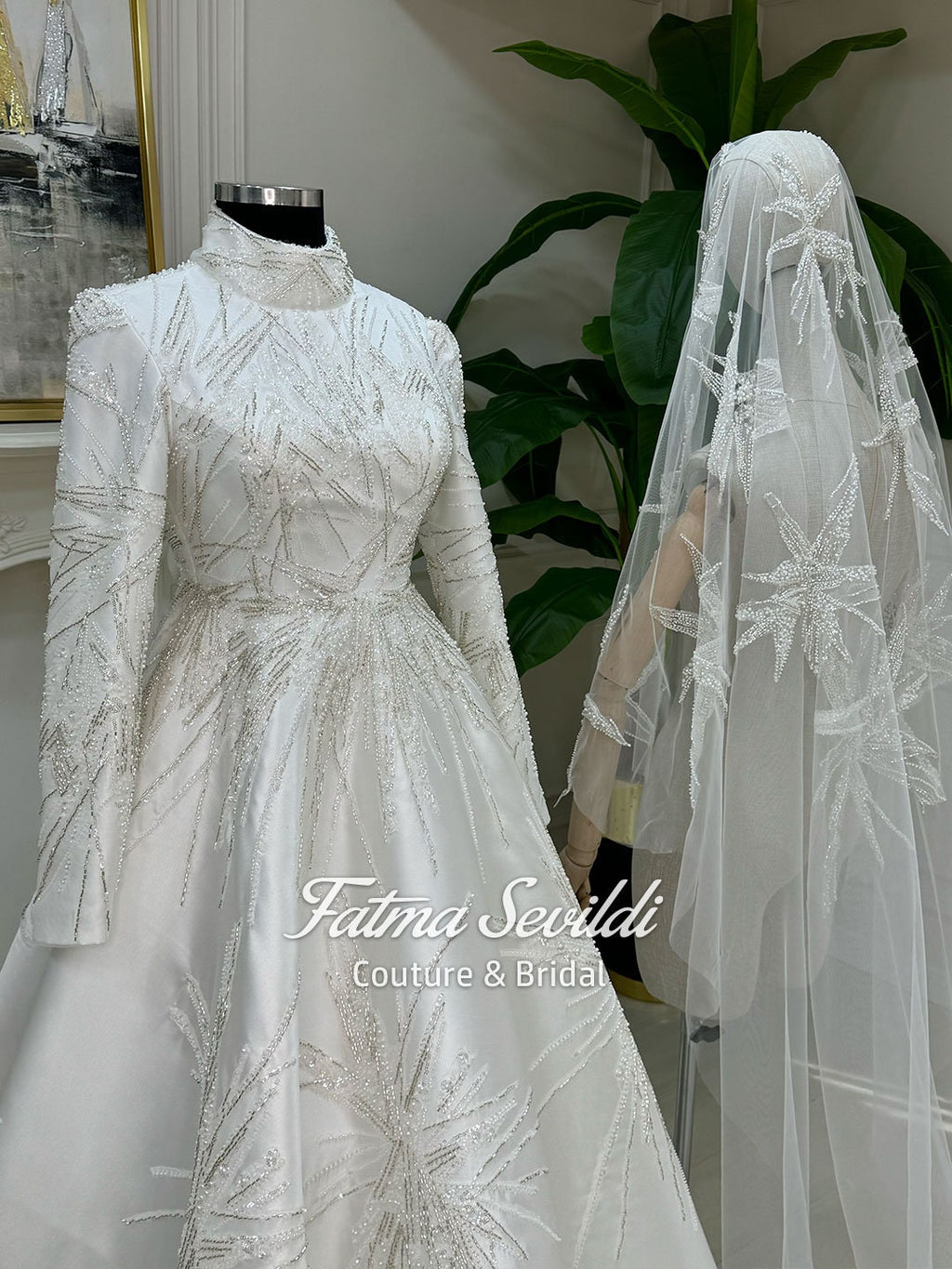 Elegant hijab wedding dress with high neck, long sleeves, beaded starburst lace