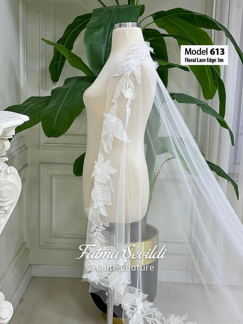 Delicate white lace edge cathedral bridal veil with hand-sewn applique