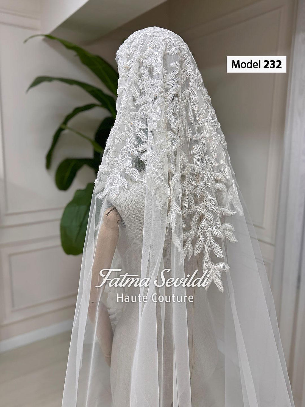 Elegant white lace veil with leaf embroidery by Fatma Sevildi for veiled hijab ballgown