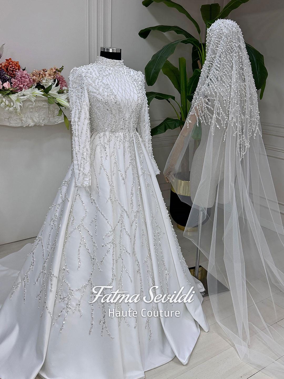 Veiled Pearl Hijab wedding dress with high neck beaded lace long sleeves