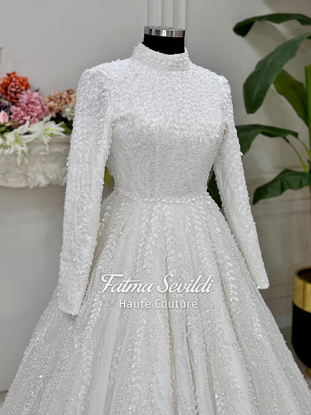 White beaded lace hijab wedding dress with high neck long sleeves