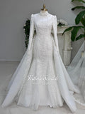 White long-sleeved mermaid hijab wedding dress with lace and detachable overskirt