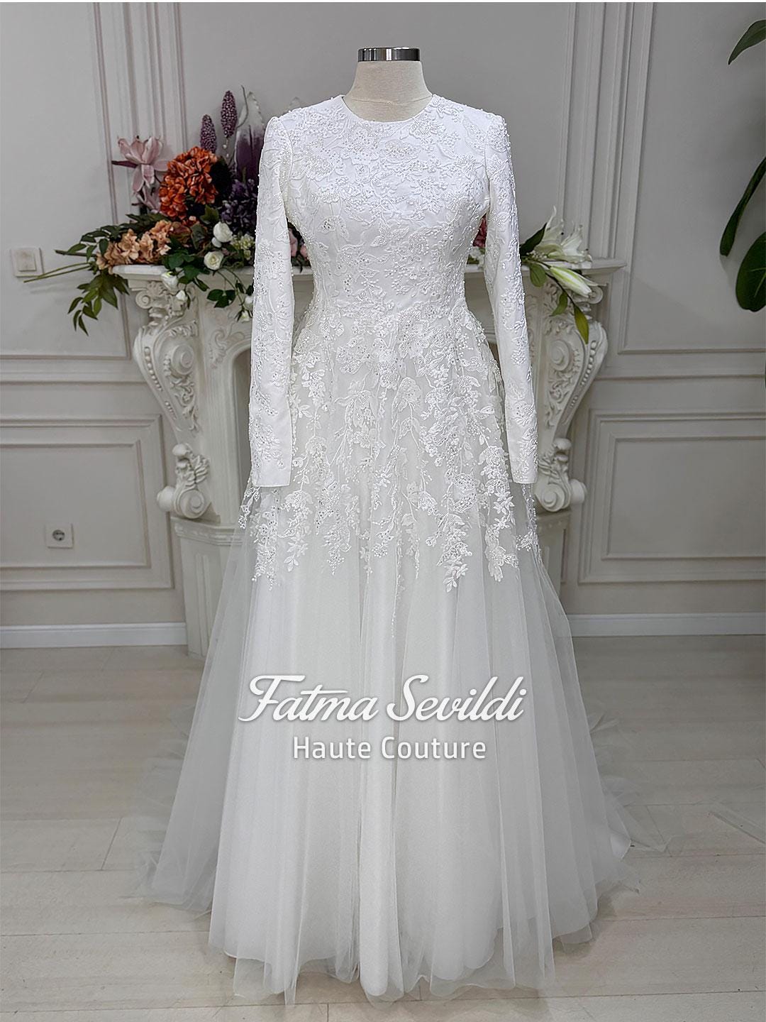 Veiled hijab wedding dress by Fatma Sevildi, beaded lace A-line gown