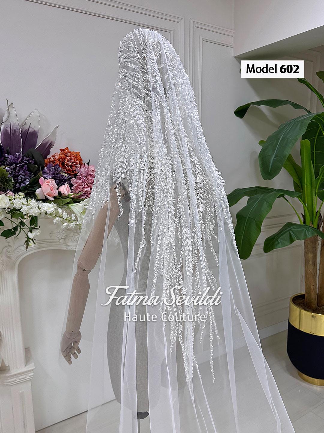 Model 602 bridal veil by Fatma Sevildi with silver beaded wheat motifs on sheer tulle