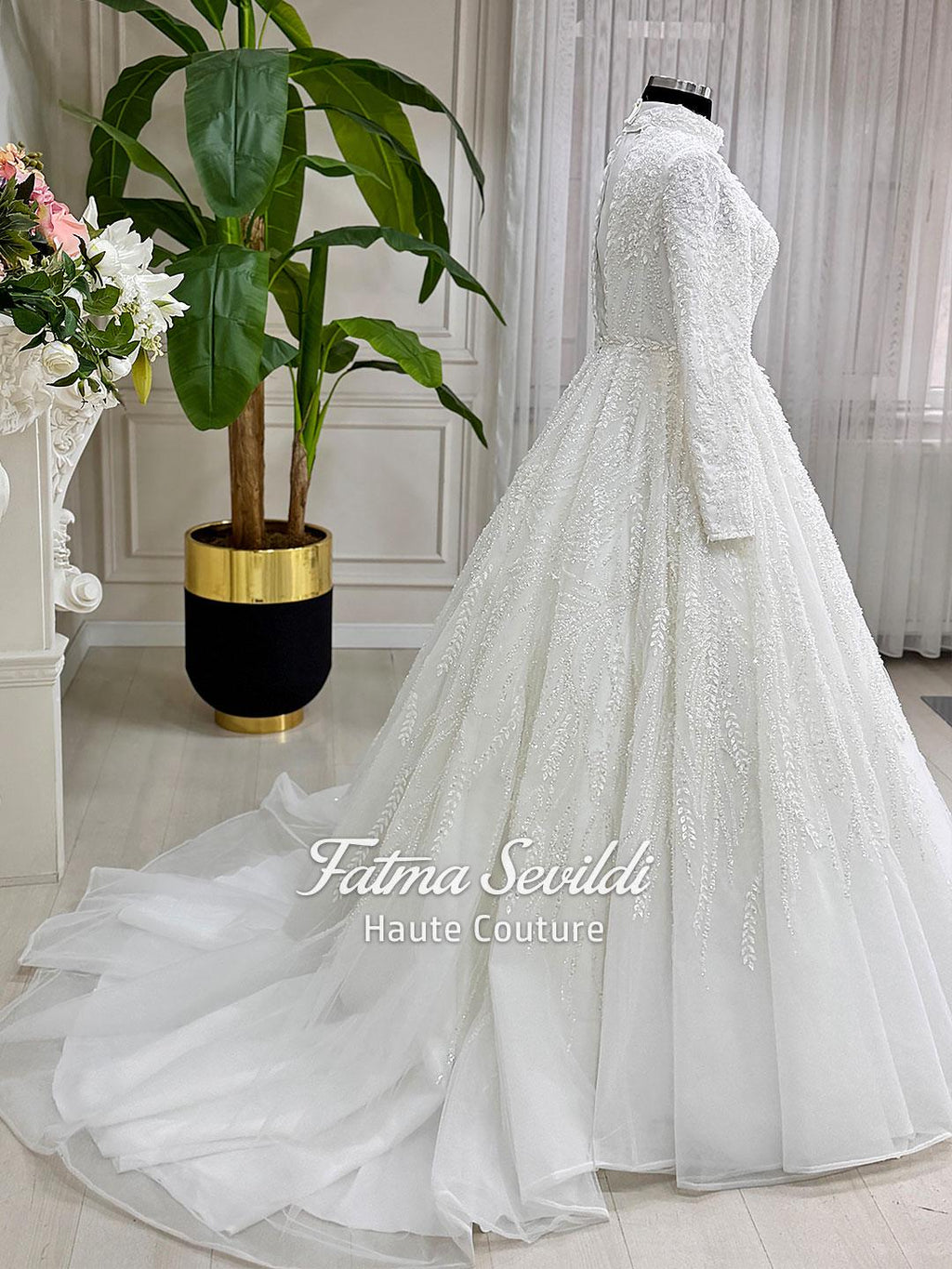 White beaded lace hijab wedding dress with high neck and long sleeves