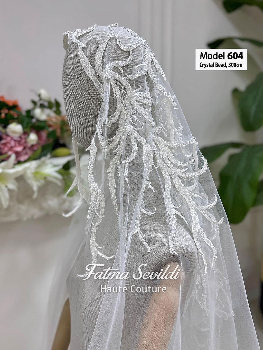 Delicate white cathedral bridal veil with crystal bead embroidery