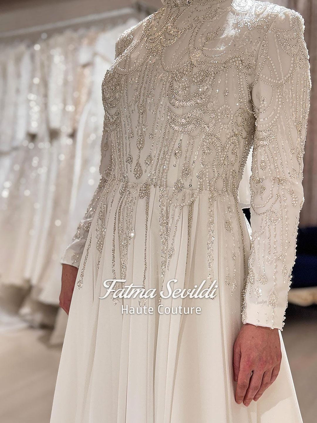 Elegant veiled Muslim wedding dress with beaded lace, long sleeves, ivory gown