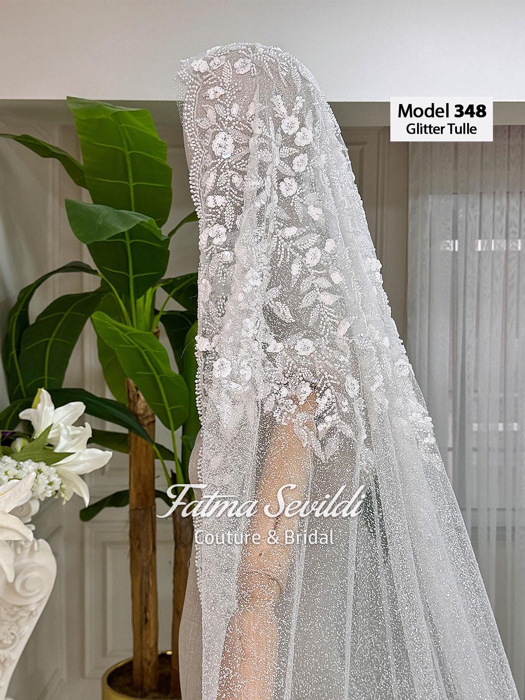 Delicate white glitter tulle cathedral veil model 348 with floral embroidery