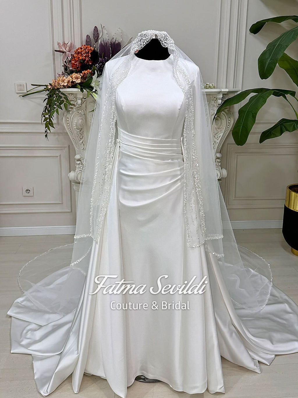 Veiled satin Muslim wedding dress with long sleeves, high neckline, beaded veil