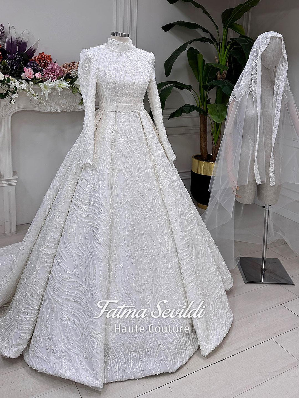 Elegant A-line hijab wedding dress with beaded lace detailing