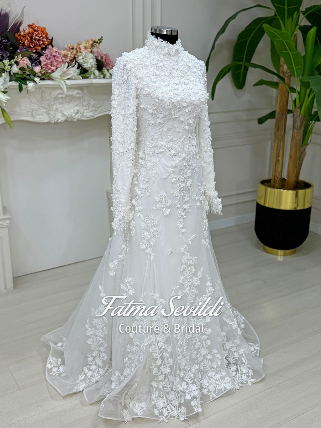 Elegant mermaid hijab wedding dress in white lace with high neck, long sleeves, 3D floral embroidery, and detachable skirt