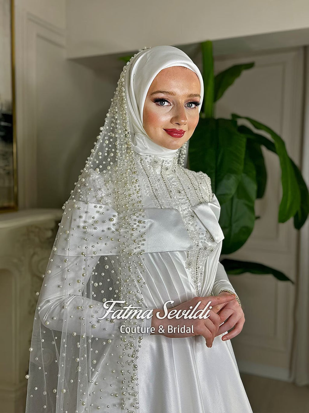 Elegant satin hijab wedding dress with pearl veil
