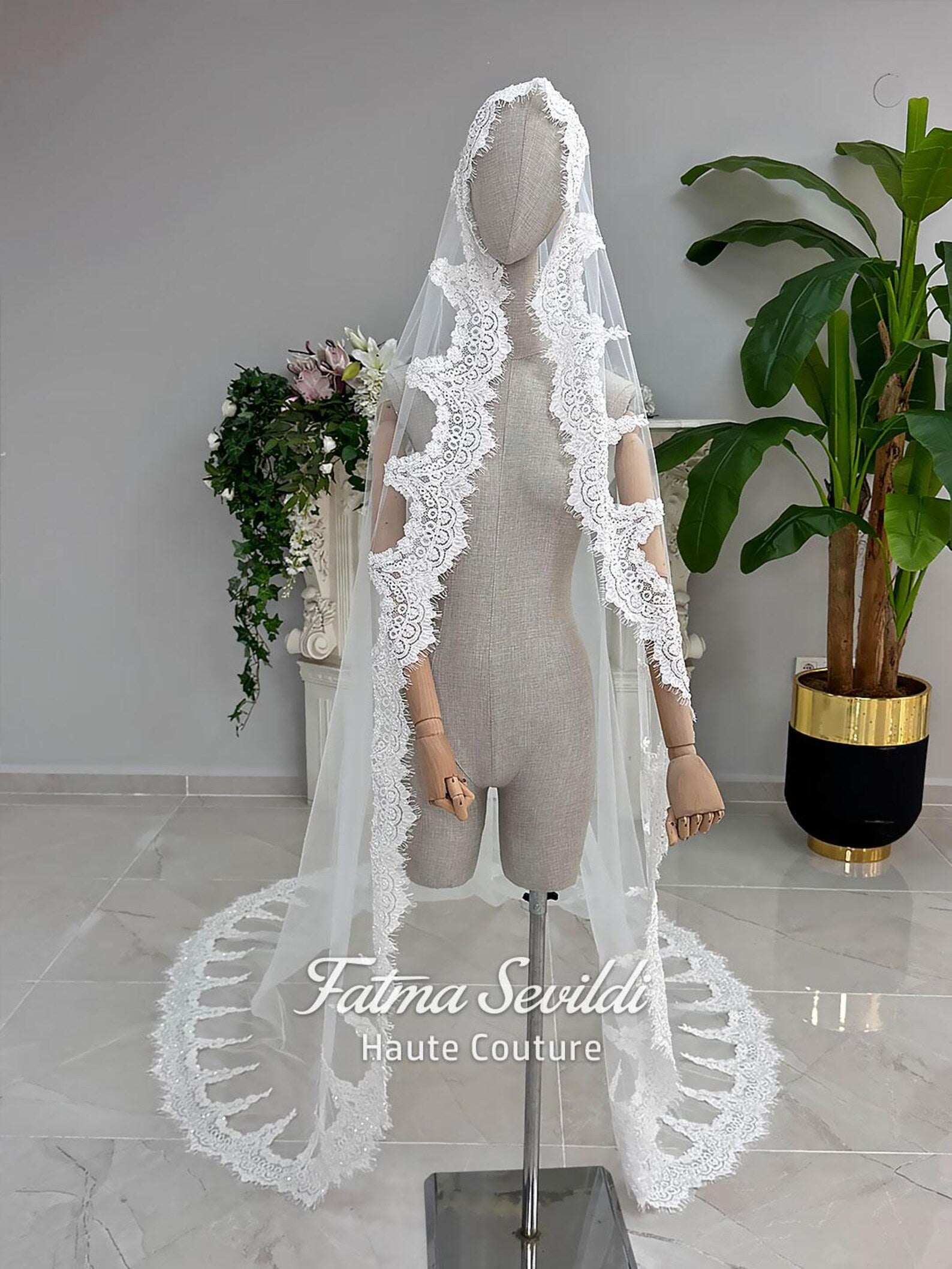 Fatma Sevildi Haute Couture hijab wedding dress, modest bridal gown with long sleeves, lace and beaded details, custom made Muslim wedding dress